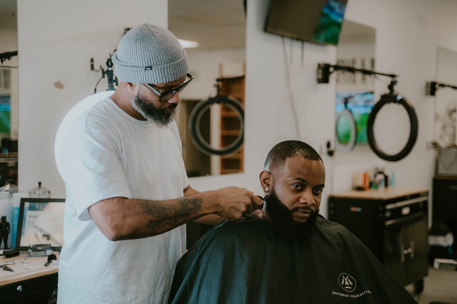 Barber finishing a straight razor shave